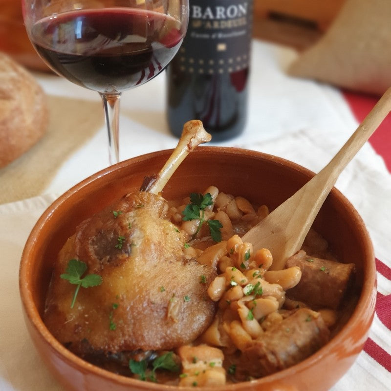 Cassoulet mit Entenconfit, flambiert mit Armagnac